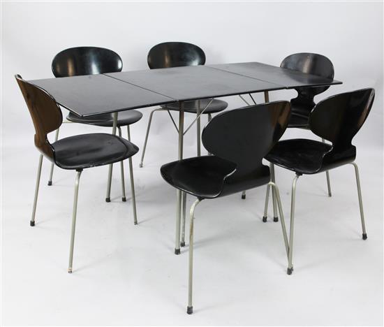 An Arne Jacobsen for Fritz Hantsen dining suite.
